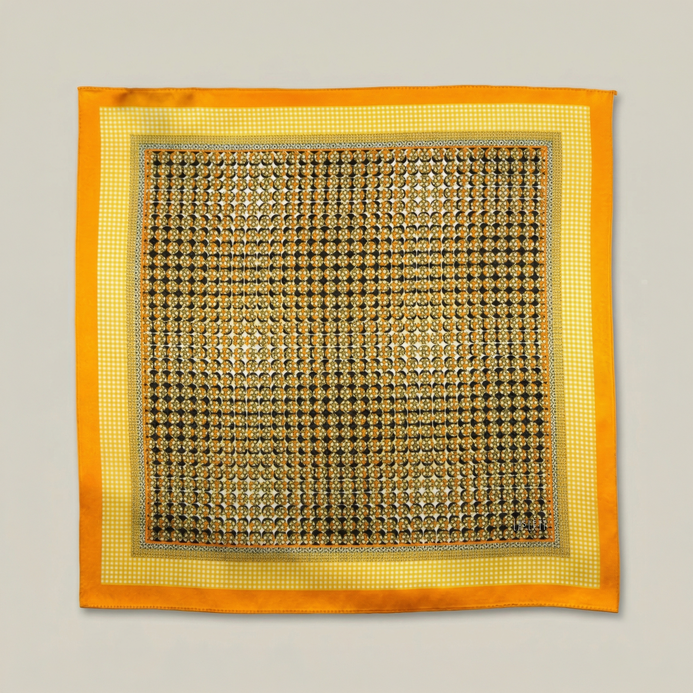 100% silk Matrix Gold Pocket Square has a futuristic geometric design that reveals, on closer inspection, repeating graphic lines and patterns across the surface. Square is shown in flat lay.