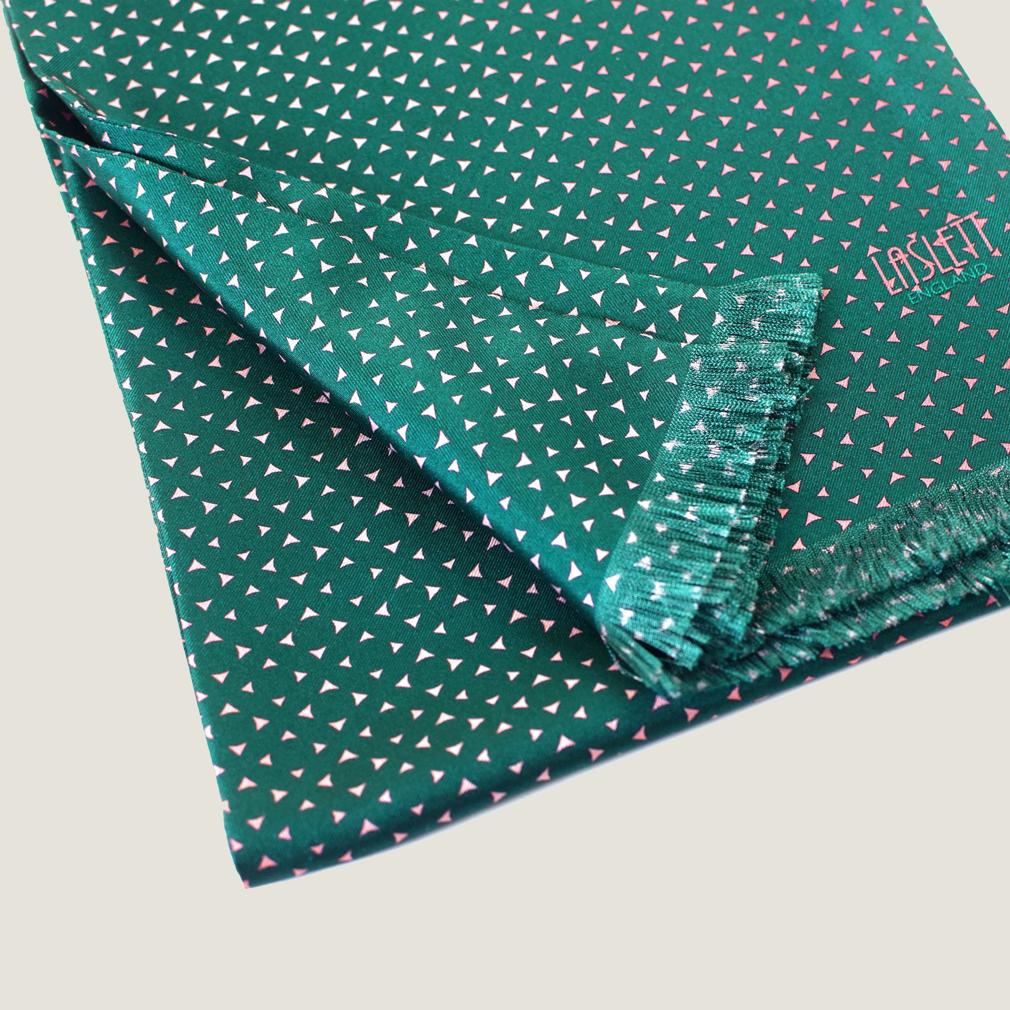 Laslett England Revival Teal Silk Oblong detail showing blush pink triangle dot print on deep teal 100% silk twill with pin-fringed hem