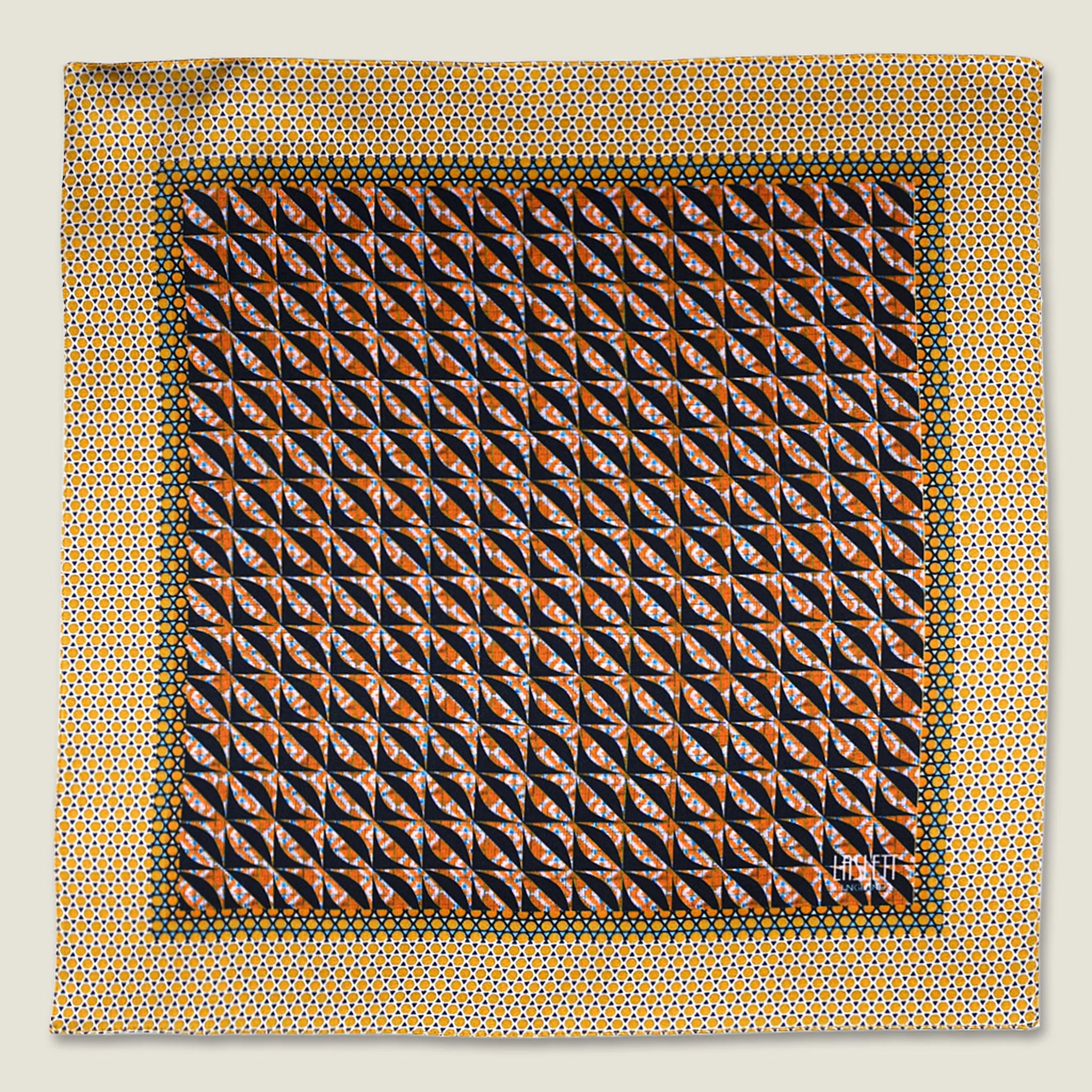 100% silk Havana Camel Pocket Square in gold and black with orange and green highlights by Laslett England. Scarf is shown in flat lay against a neutral background.