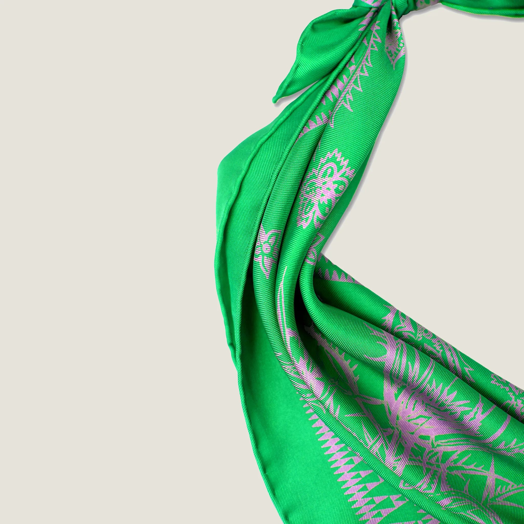 100% silk Marettimo Jewel Green Silk Bandana by Laslett England shown in close up to reveal the pink botanical and maritime detail.