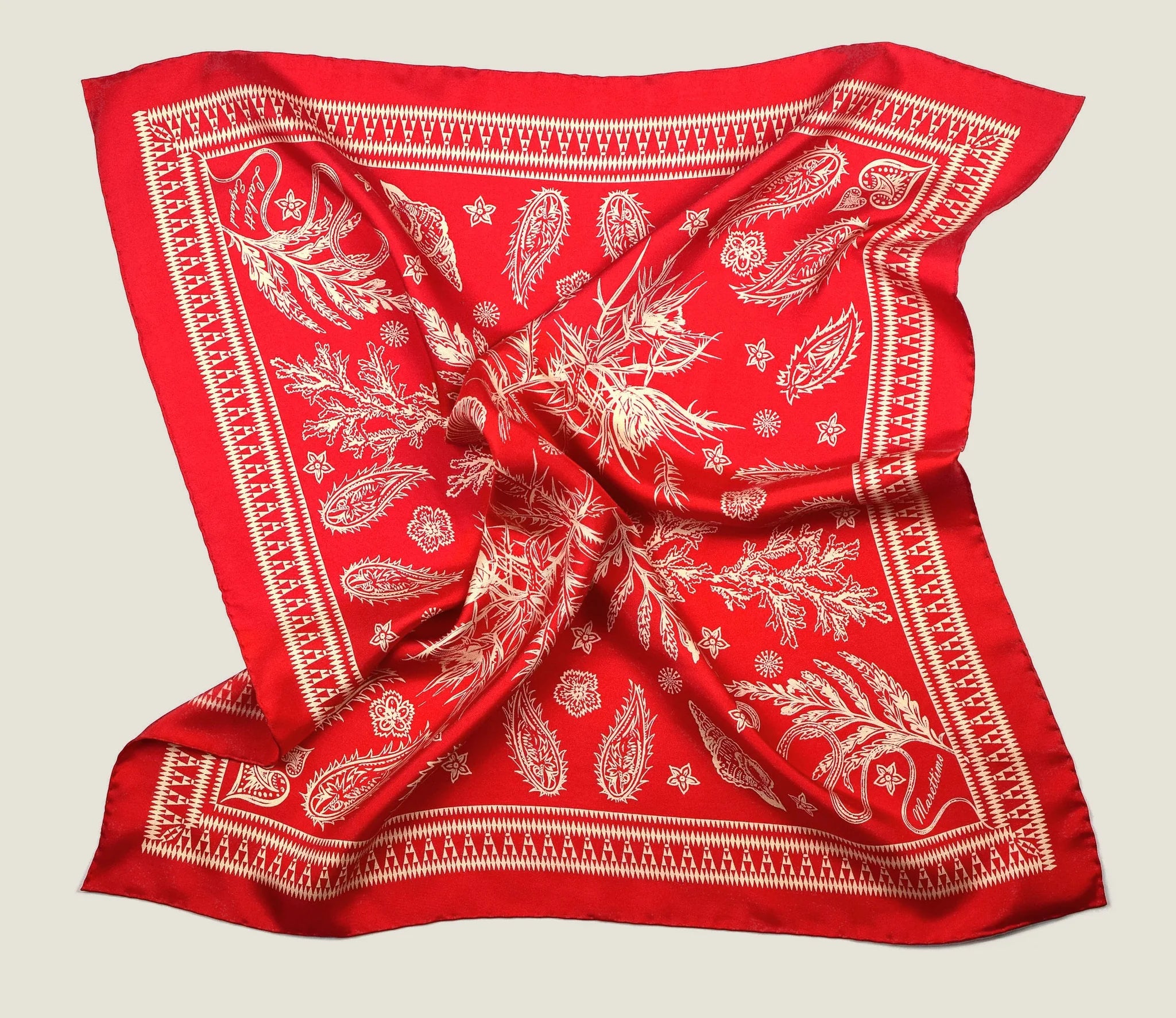 100% silk Marettimo Red Silk Bandana in red by Laslett England. Scarf is shown in flat lay against a neutral background.