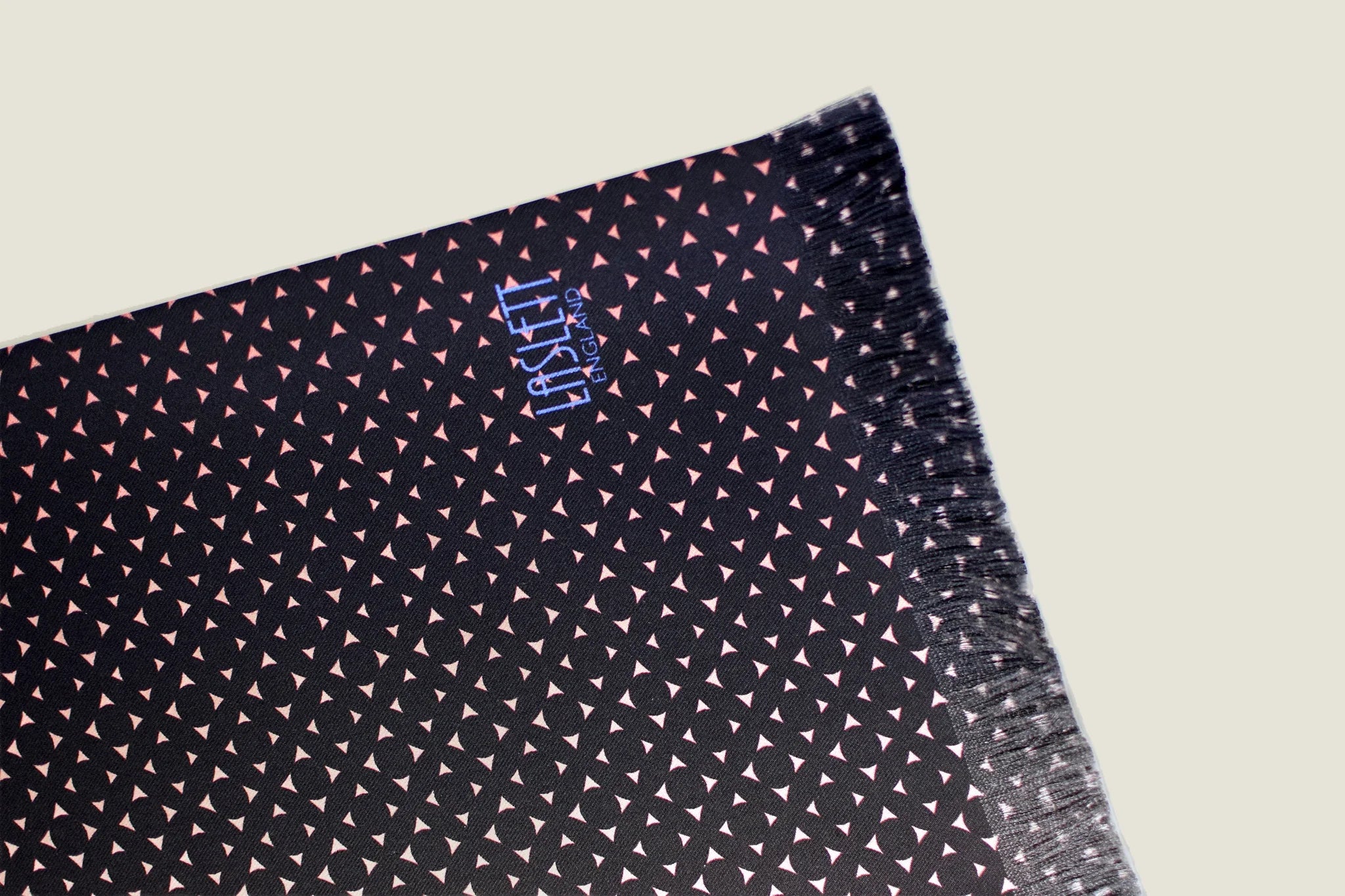 Laslett England Revival Mocha Silk Oblong folded flat showing mocha brown and peach geometric dot print on silk twill.