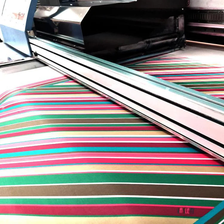 100% silk Seaside Vintage Chiffon Stole in pink and green by Laslett England. Stole shown being manufactured.