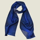 Laslett England Lapis Blue silk oblong tied at the neck to show the contrasting geometric pattern on each side. 