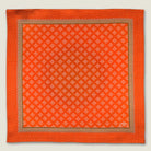 100% silk Batik Orange Pocket Square in orange by Laslett England shown in flat lay. 