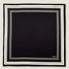 Laslett England Gambit Ivory pocket square folded flat, showing full black ground with ivory border.