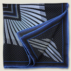 Laslett England Houston Midnight Silk Bandana folded flat showing radial stripe and geometric border detail on midnight blue silk twill.