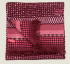 Laslett England Monaco Burgundy Silk Oblong folded flat showing both sides, burgundy dot print alongside pink and burgundy stripe border on 100% silk twill.