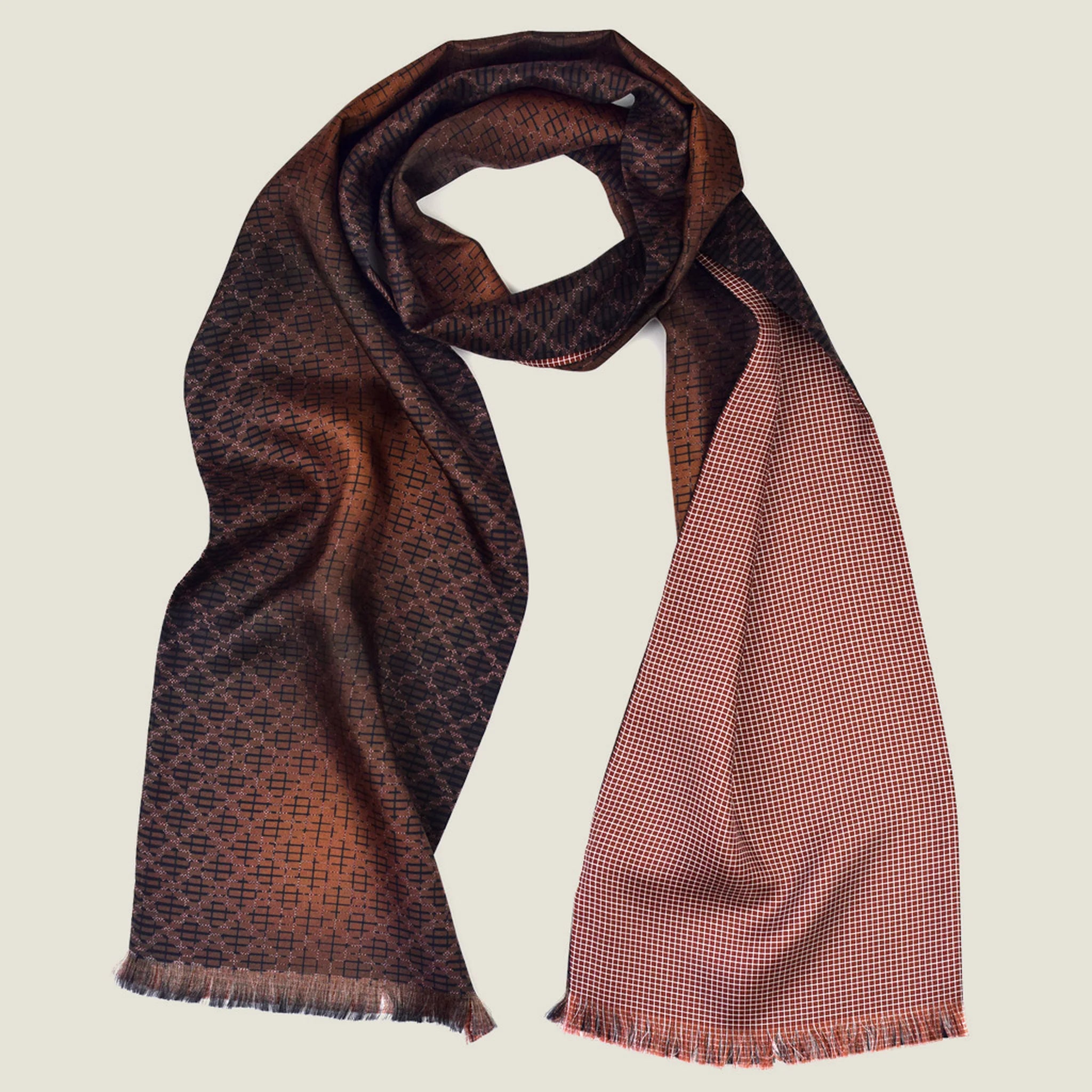 Laslett England Mosaic Copper Silk Oblong flat lay, 21cm x 165cm double-sided silk twill showing copper trellis print and terracotta micro check reverse with pin-fringed hem.