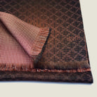 Laslett England Mosaic Copper Silk Oblong folded flat showing both sides, copper trellis print alongside terracotta micro check on 100% silk twill with pin-fringed hem.