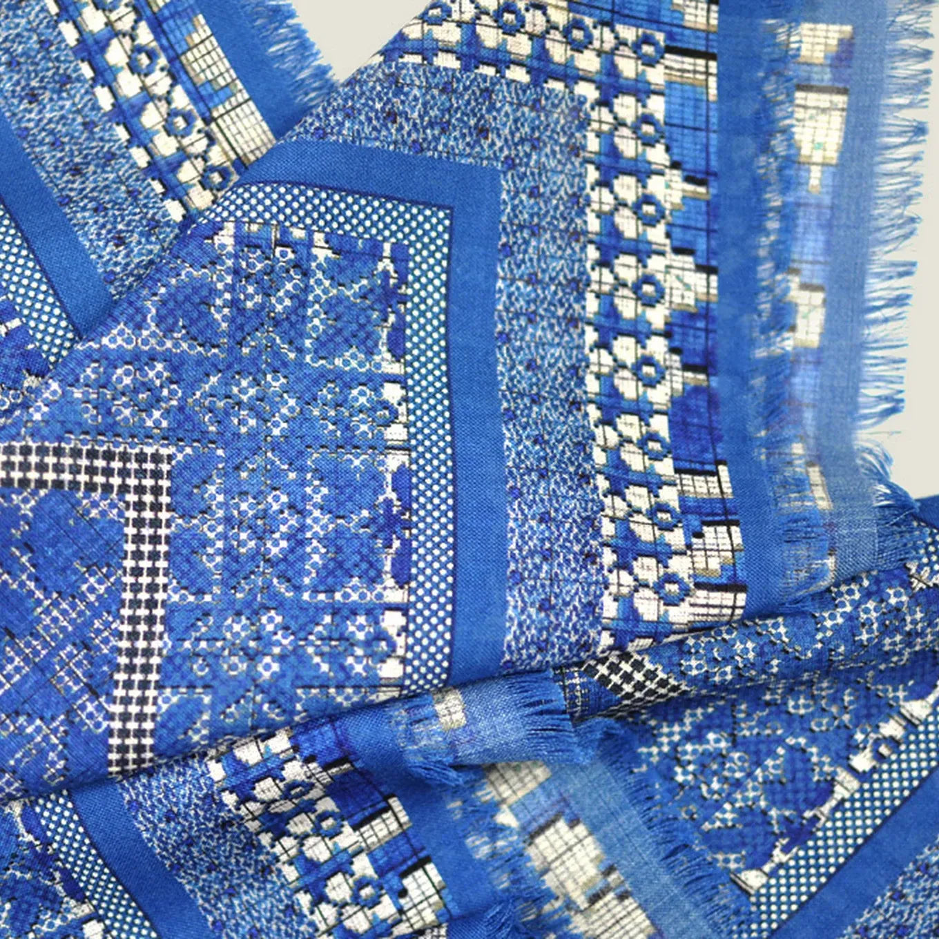 Laslett England Nordic Indigo Superfine Square detail showing 18th century weaving draft folk pattern in indigo and cream on wool silk blend