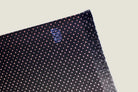 Laslett England Revival Mocha Silk Oblong folded flat showing mocha brown and peach geometric dot print on silk twill.