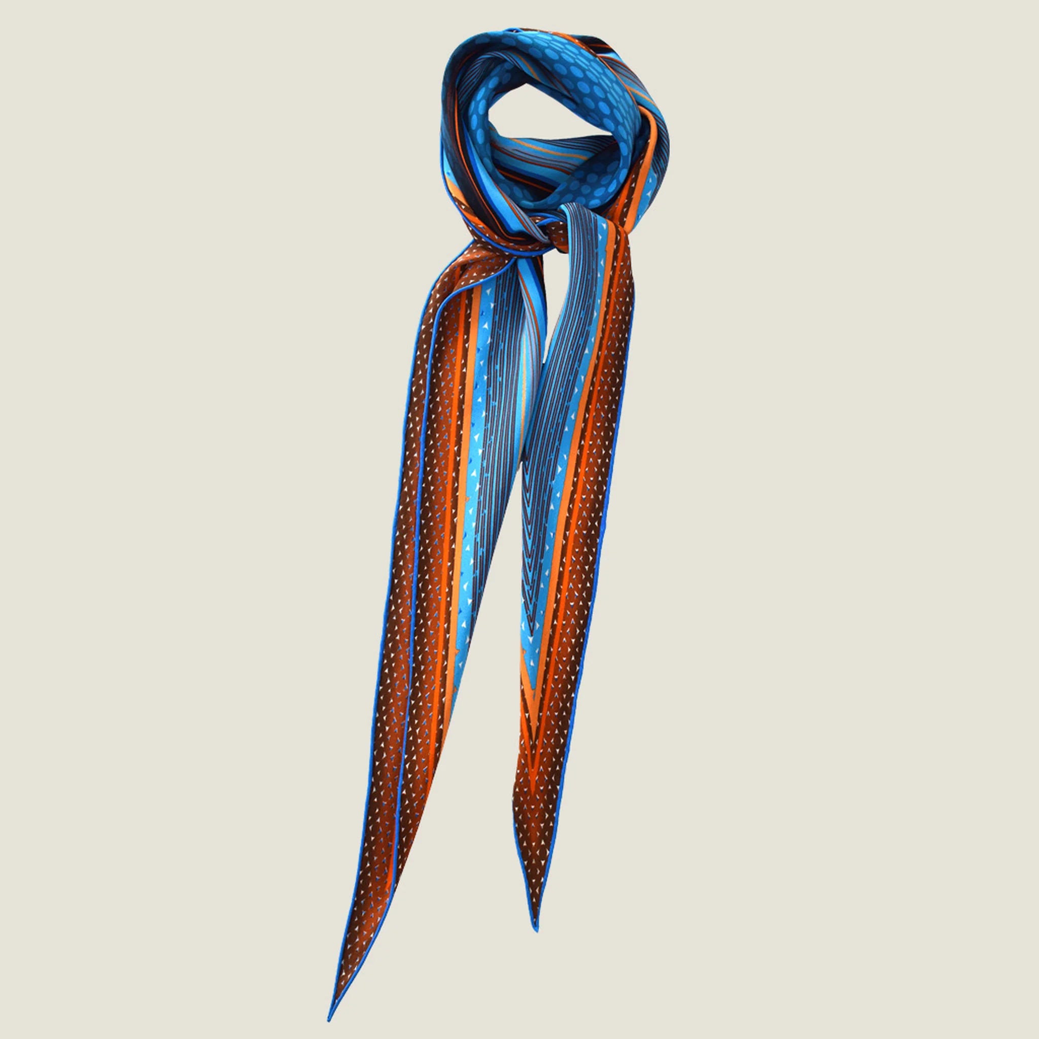 100% silk Sunset Orange Laslett Diamond in orange and blue by Laslett England. Scarf is shown tied around the neck against a neutral background. 