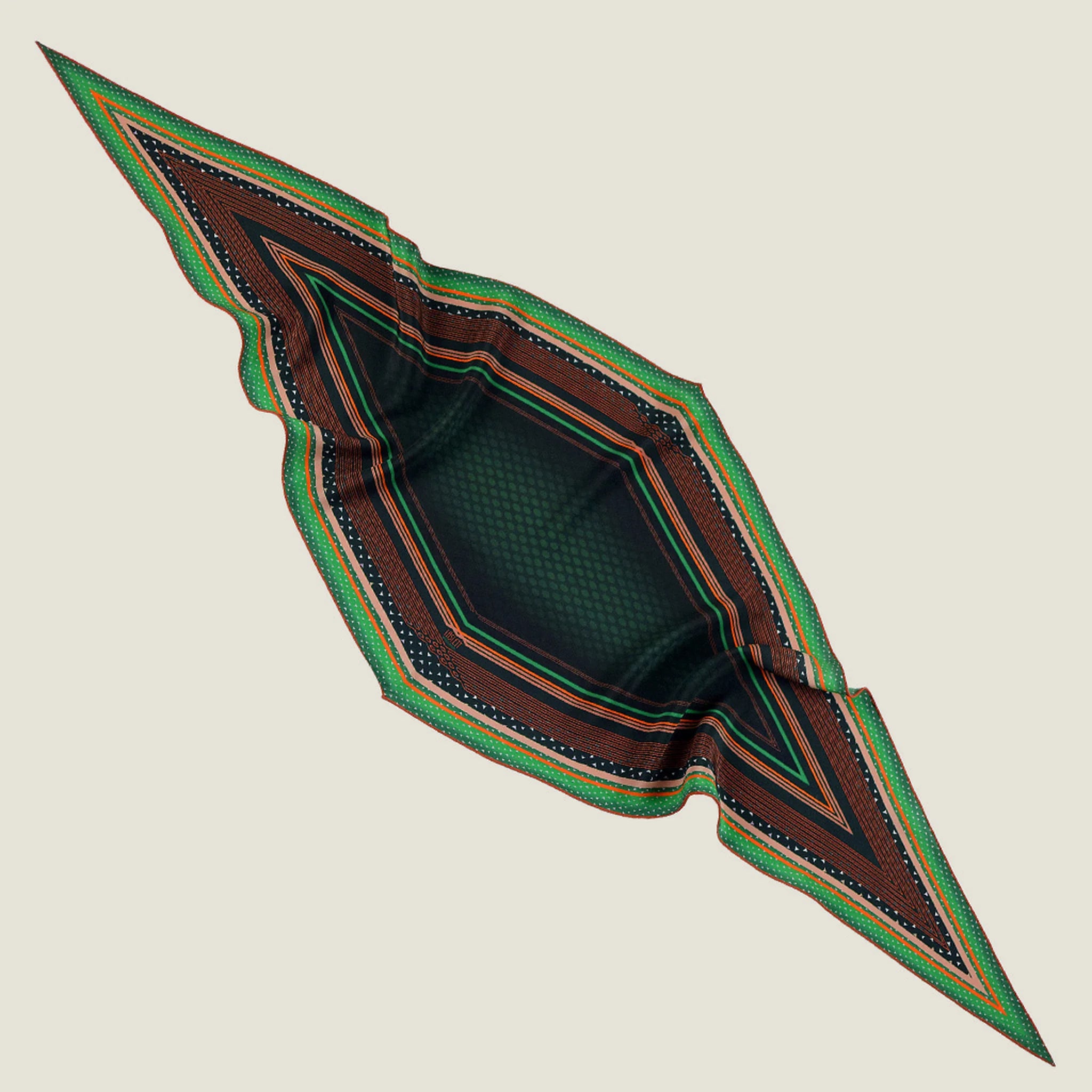 100% silk Riviera Emerald Laslett Diamond in orange; green; geometric by Laslett England. Laid out in a diamond crumpled shape against a neutral background. 
