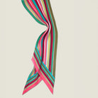 100% silk Seaside Vintage Chiffon Stole in pink and green by Laslett England. Shown folded in half on a neutral background. 