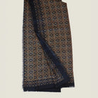 Laslett England Starry Midnight Laslett Wrap folded neatly, showing deep blue-black and bronze micro-star print with hand-fringed hem