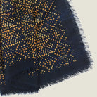 Laslett England Starry Midnight Laslett Wrap detail showing bronze micro-star print on deep blue-black 100% superfine wool ground