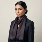 Laslett England Revival Mocha silk oblong shown tied loosely around a female model's neck. 