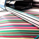 100% silk Seaside Vintage Chiffon Stole in pink and green by Laslett England. Stole shown being manufactured. 